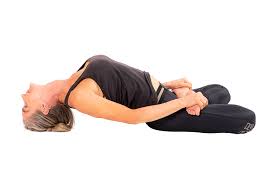 Fish Pose (Matsyasana) yoga pose for stretching the neck and stimulating thyroid health.